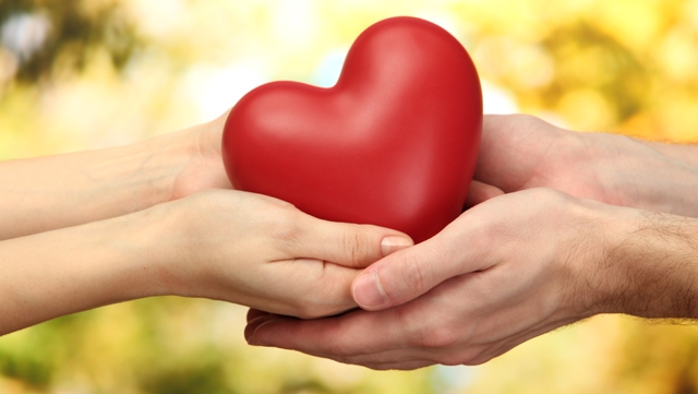 5 Ways to Fundraise for an Automated External Defibrillator Hands holding heart